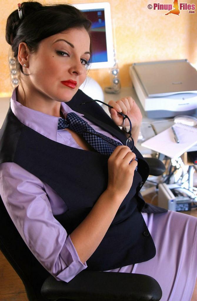 Executive Lorna Morgan poses in a tie showing her big tits and firm ass  in Pinup Files set Dressed For The Office