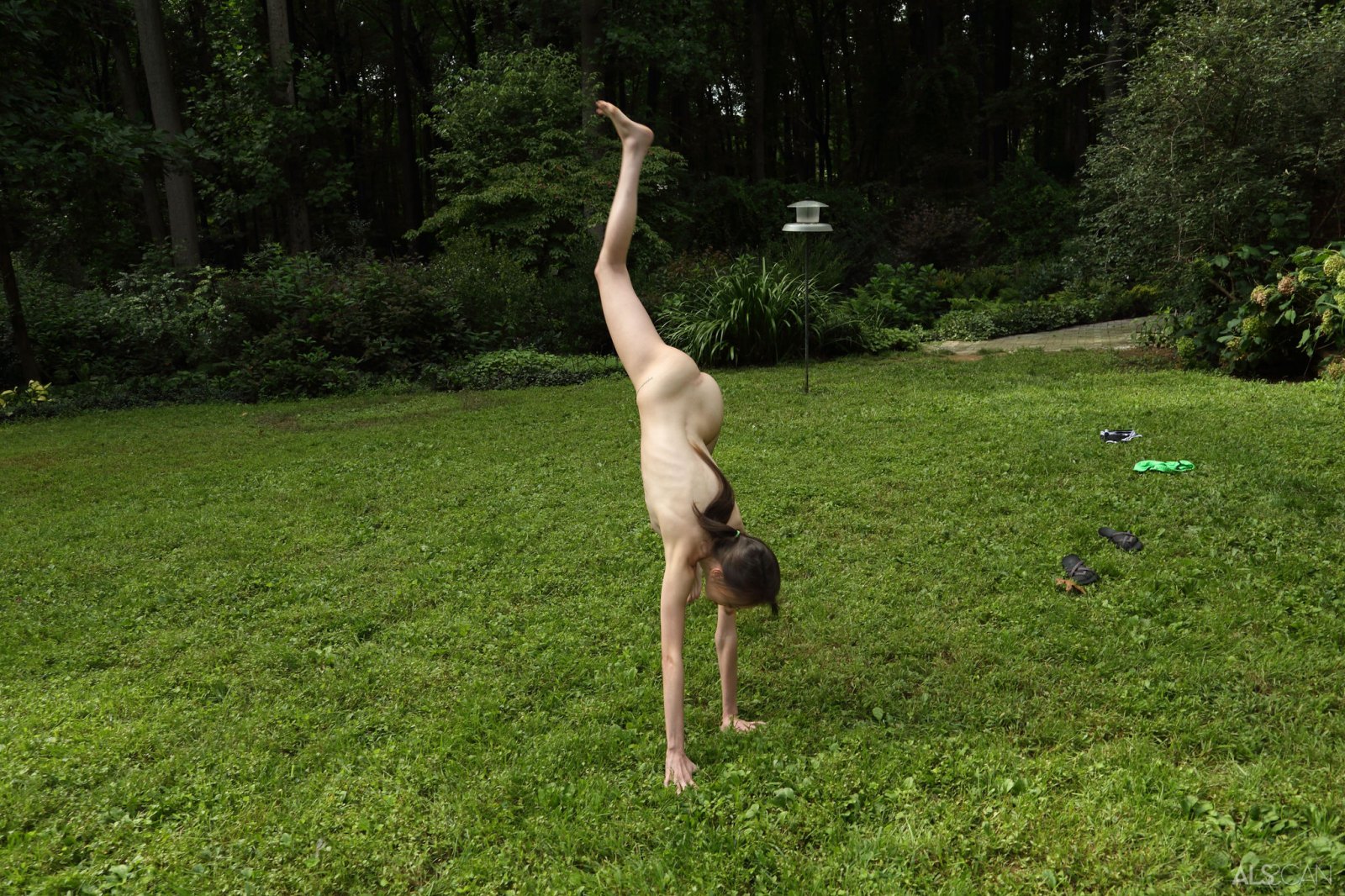 Skinny and flexible brunette Aria Haze having fun outdoors in the backyard  in Als Scan set Corn Hole