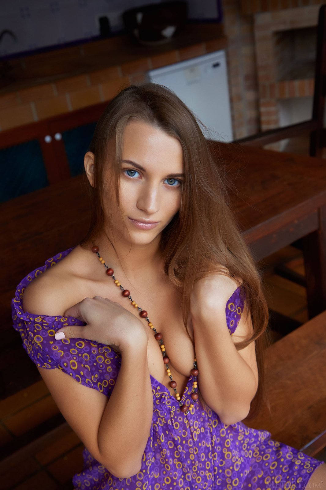 Magnificent brunette takes off her purple dress exposing her luscious tanned body  in Metart set Sleek In Purple