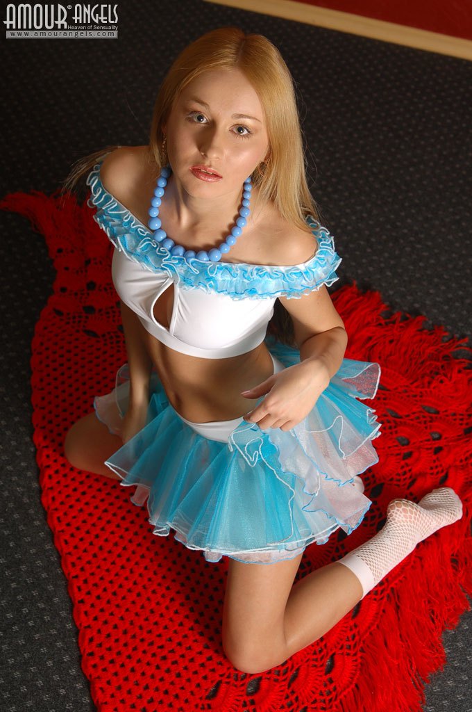 Fresh gorgeous babe in a blue skirt Anna undressing for you  in Amour Angels set The Triangle