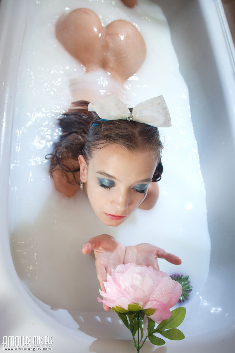 Sweet but kinky Alisabelle seductively poses in the mil bath  in Amour Angels set Latte