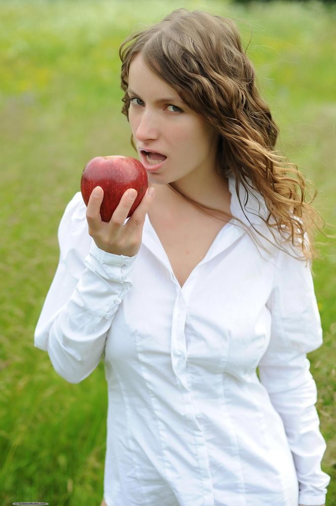 Ekitti leads you into temptation with open white peasant blouse and juicy apple