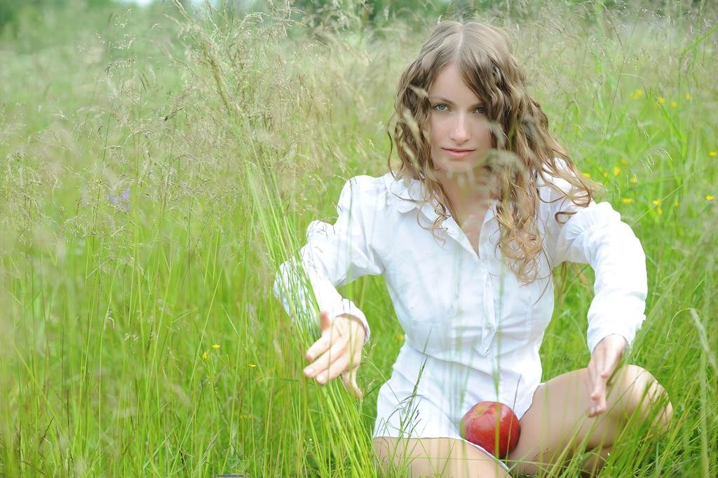 Ekitti leads you into temptation with open white peasant blouse and juicy apple