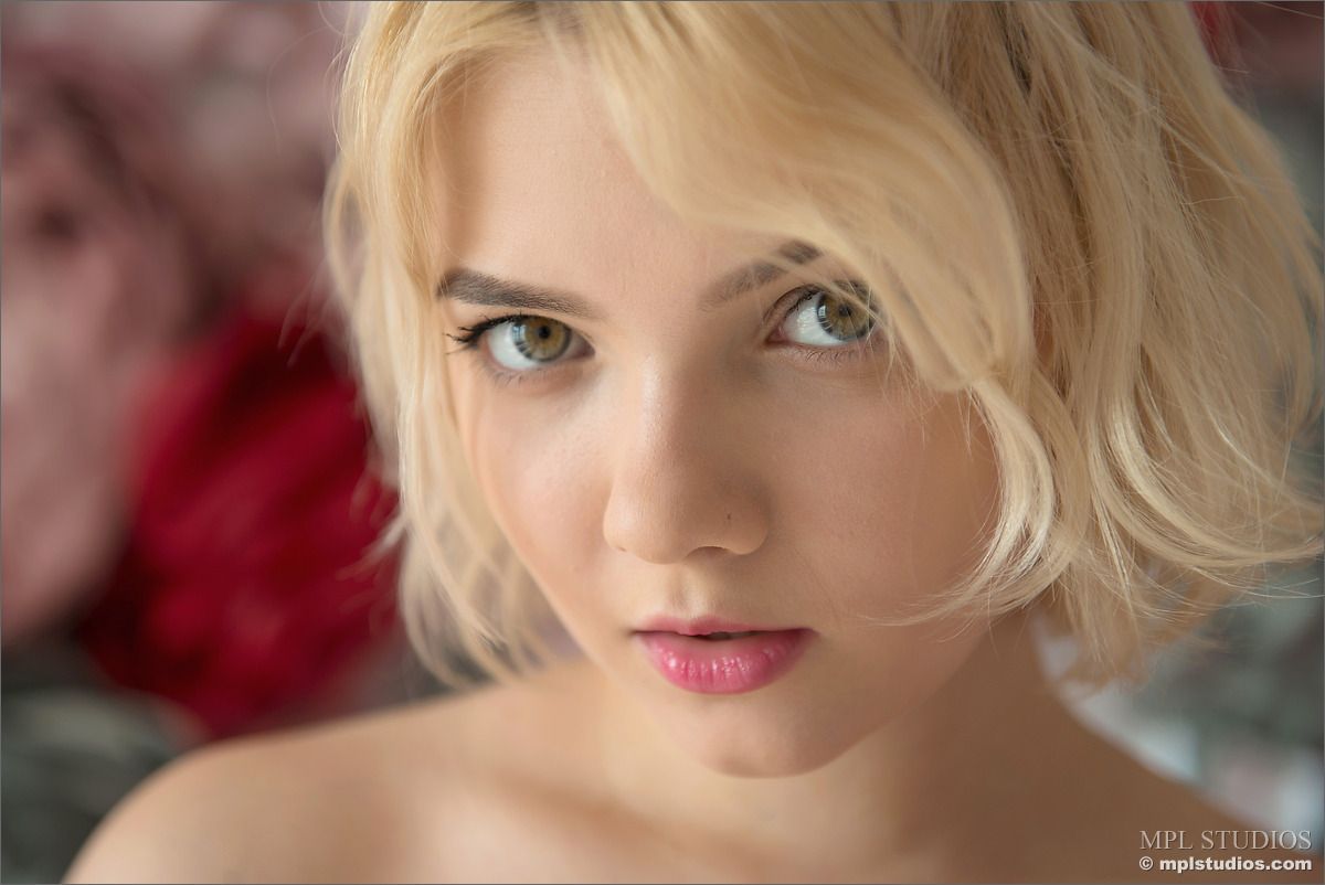 Short haired blonde Cali looks like modern Marilyn Monroe and she is posing so seductive  in MPL Studios set The Flower Patch