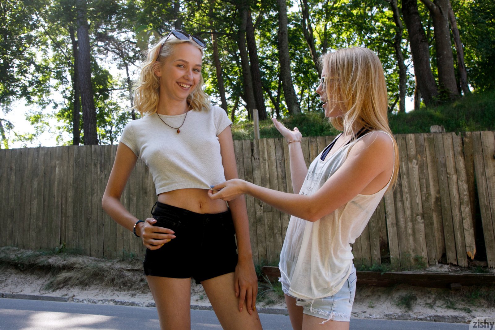 Two young and beautiful blonde babes playfully pose in nature  in Zishy set Sunny Bunnies Pt 1