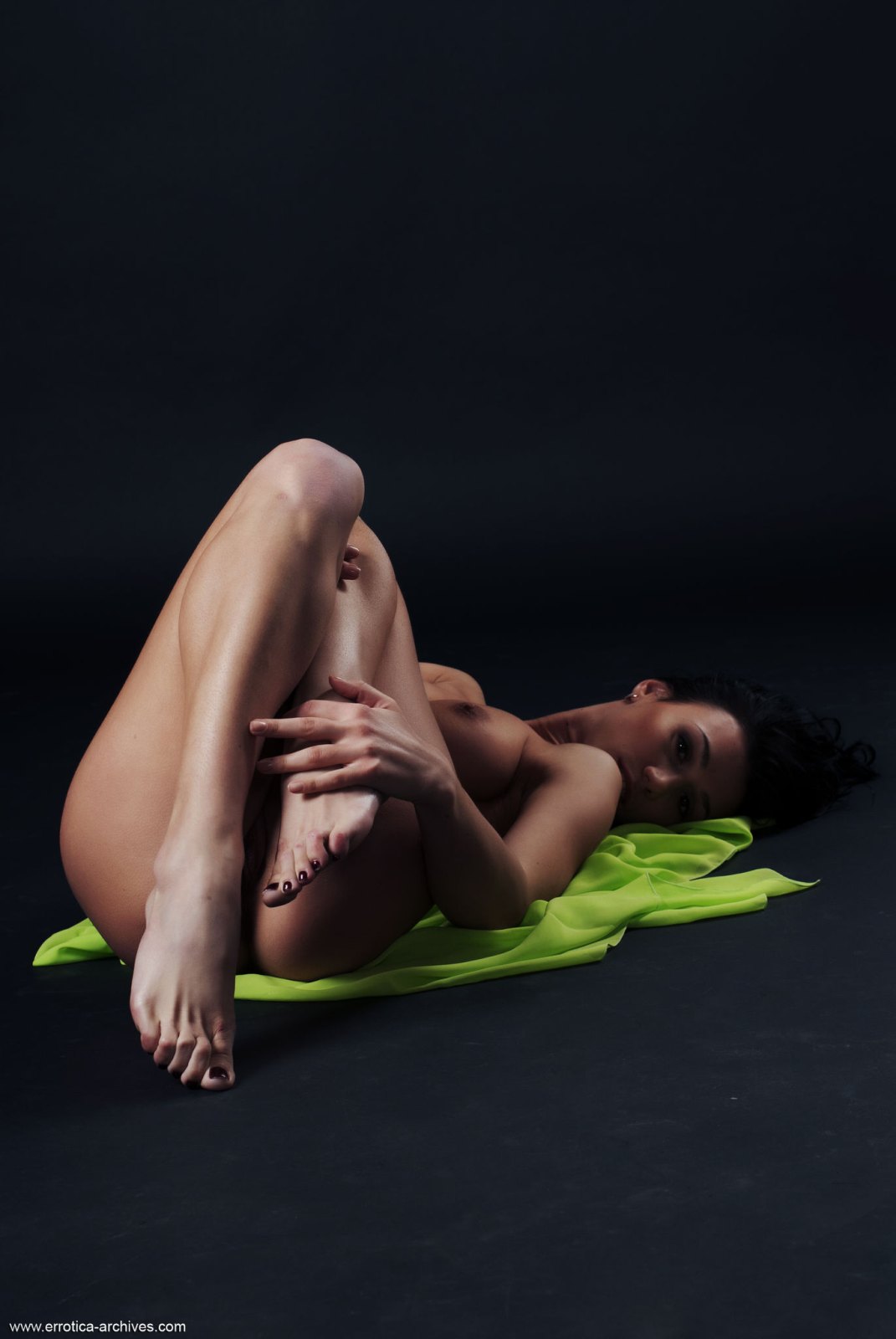 Incredibly hot Magda A takes off her green dress and flaunts her athletic body  in Errotica Archives set Magda A