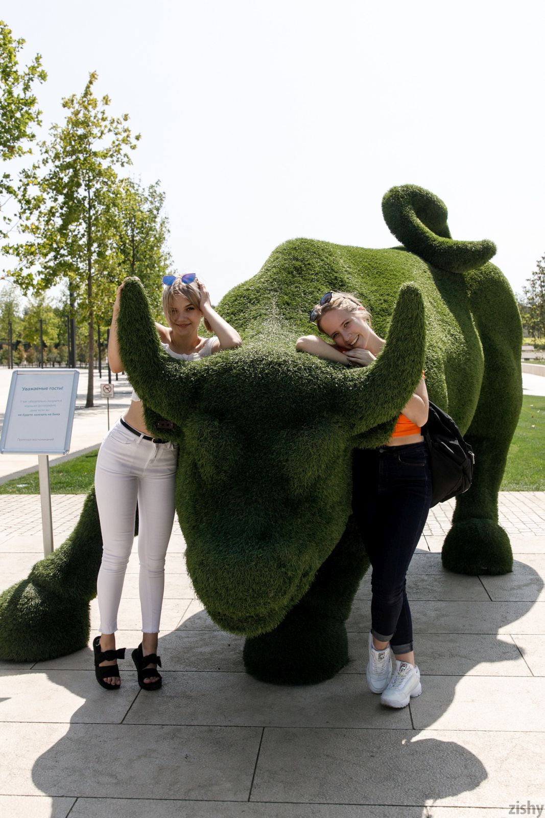 Busty brunette Diana and her blonde friend Victoria teasing with their attributes in public  in Zishy set World Cups