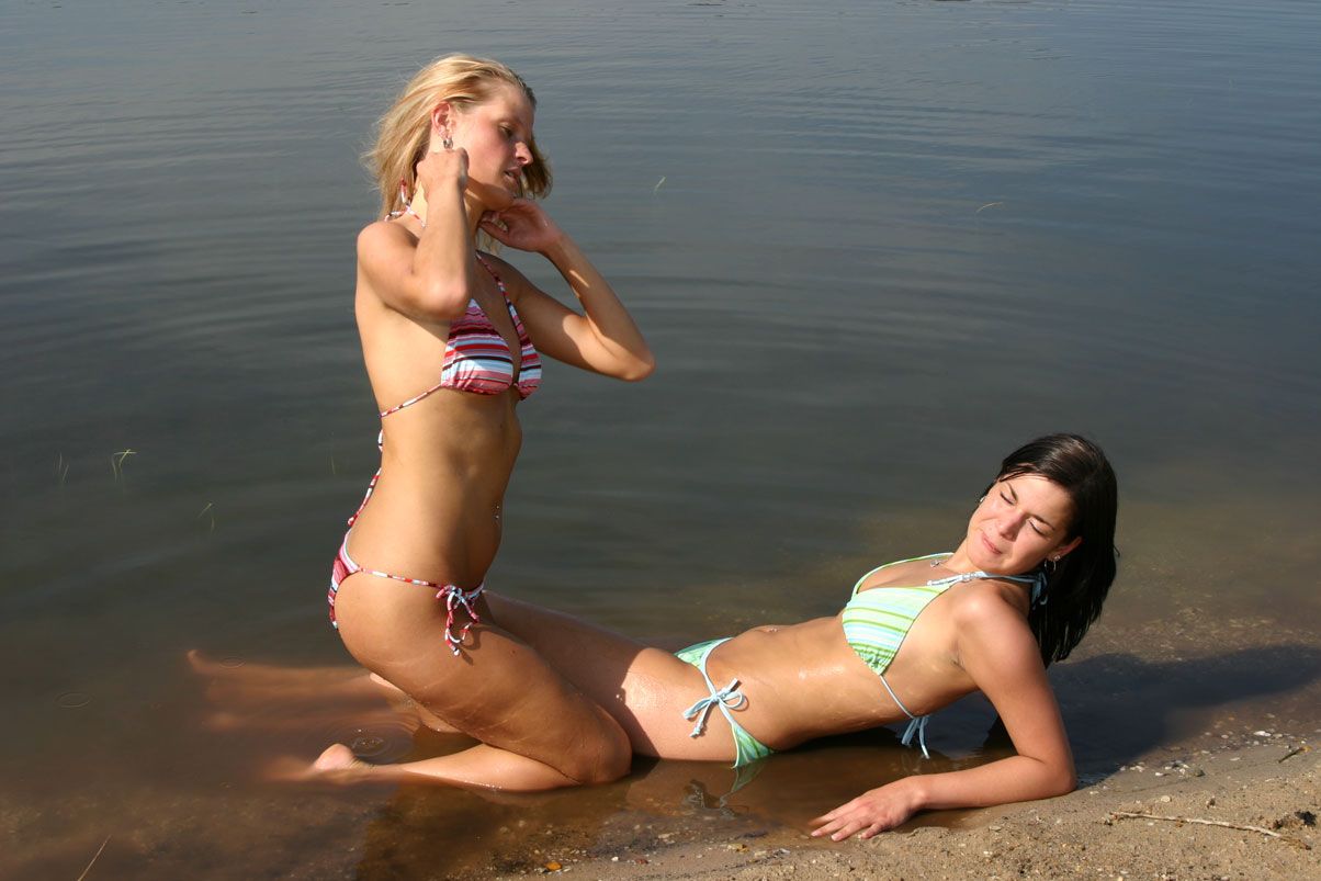 Check out the girls in their bikinis by the water