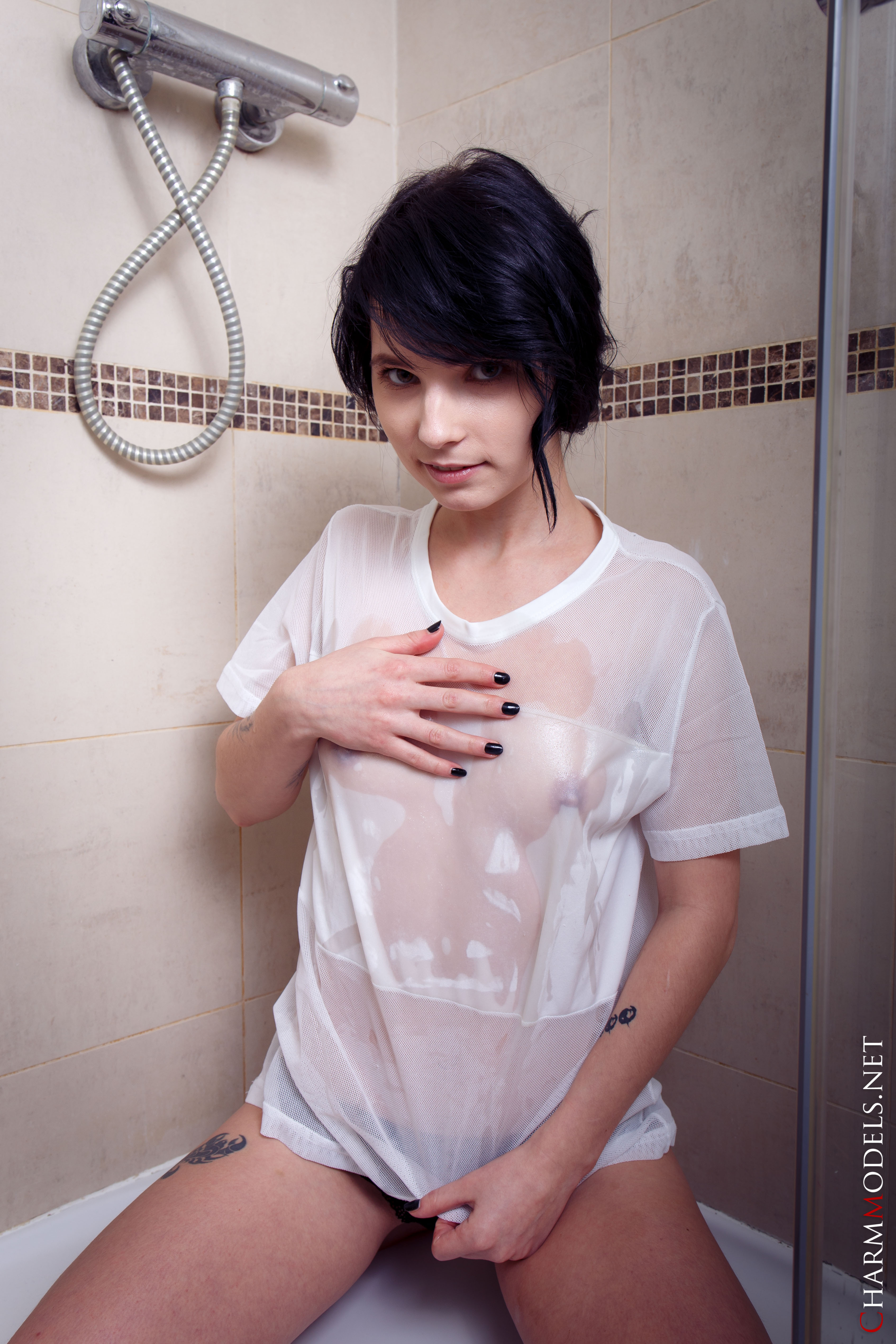 Young and seductive Voodoo poses in the bathtub with her shirt soaked wet  in Charm Models set Emo Teenager Oiled