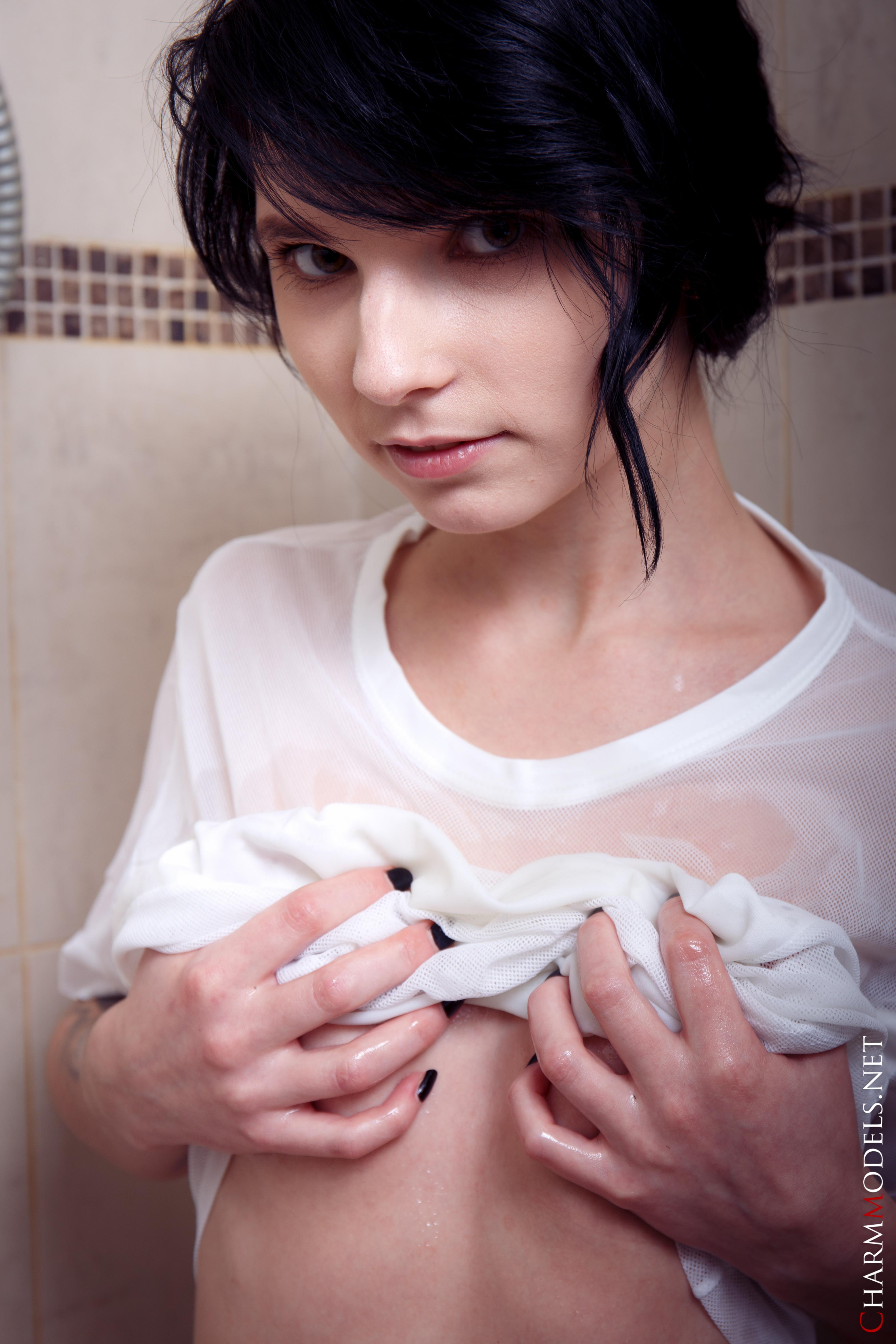 Young and seductive Voodoo poses in the bathtub with her shirt soaked wet  in Charm Models set Emo Teenager Oiled