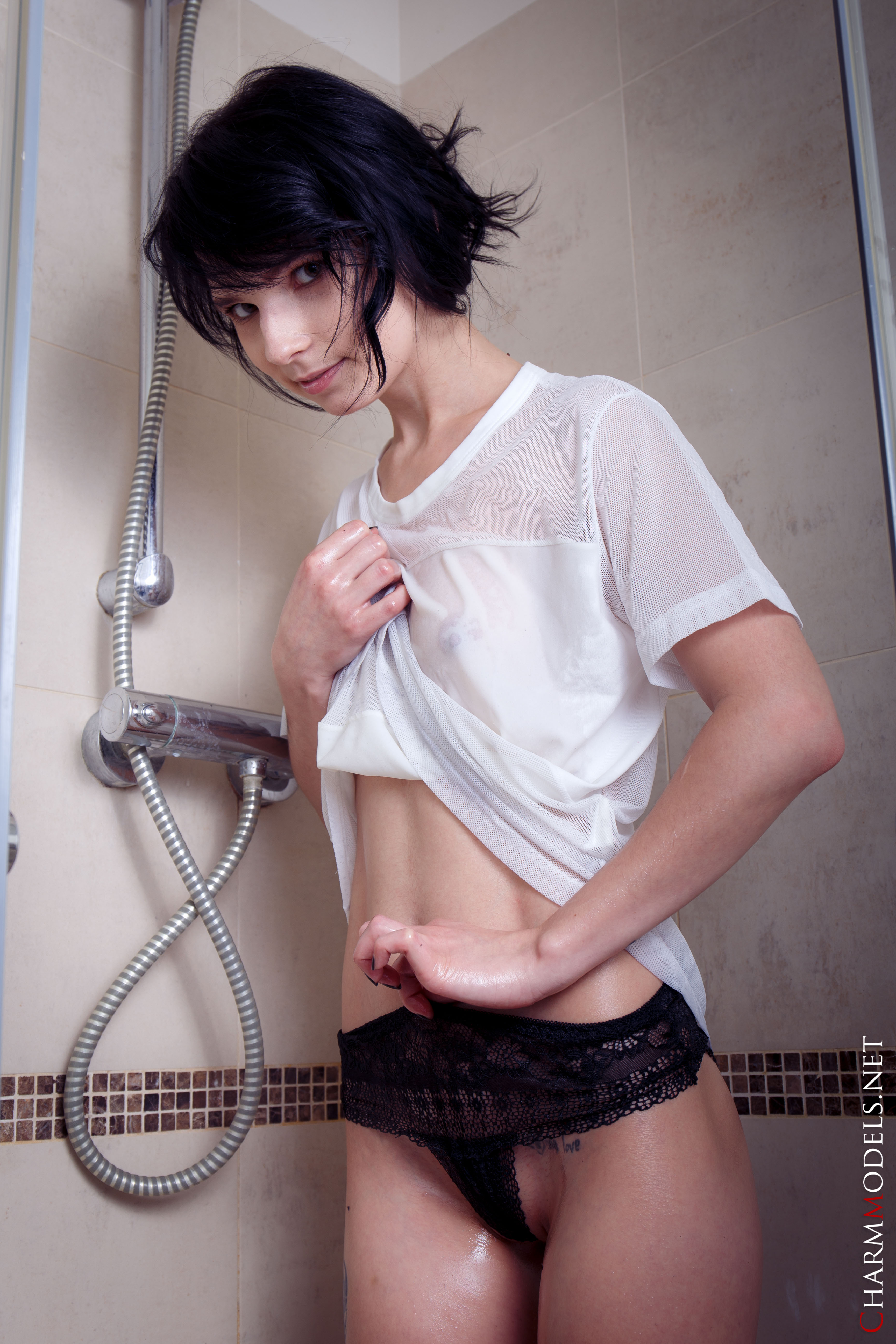 Young and seductive Voodoo poses in the bathtub with her shirt soaked wet  in Charm Models set Emo Teenager Oiled