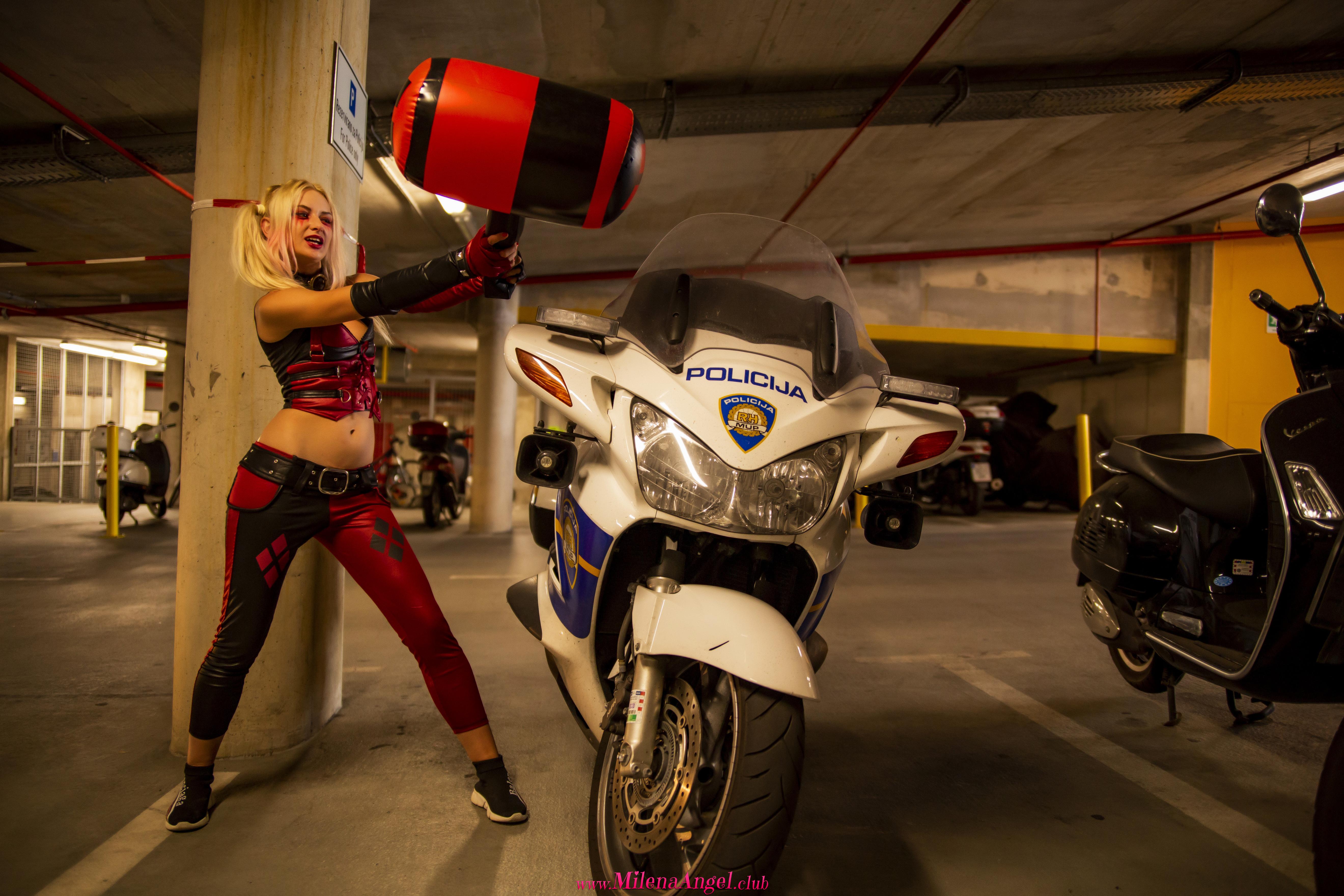 Adventurous blondie attractively poses through the city while wearing Harley Quinn costume  in Milena Angel set HQ Candid