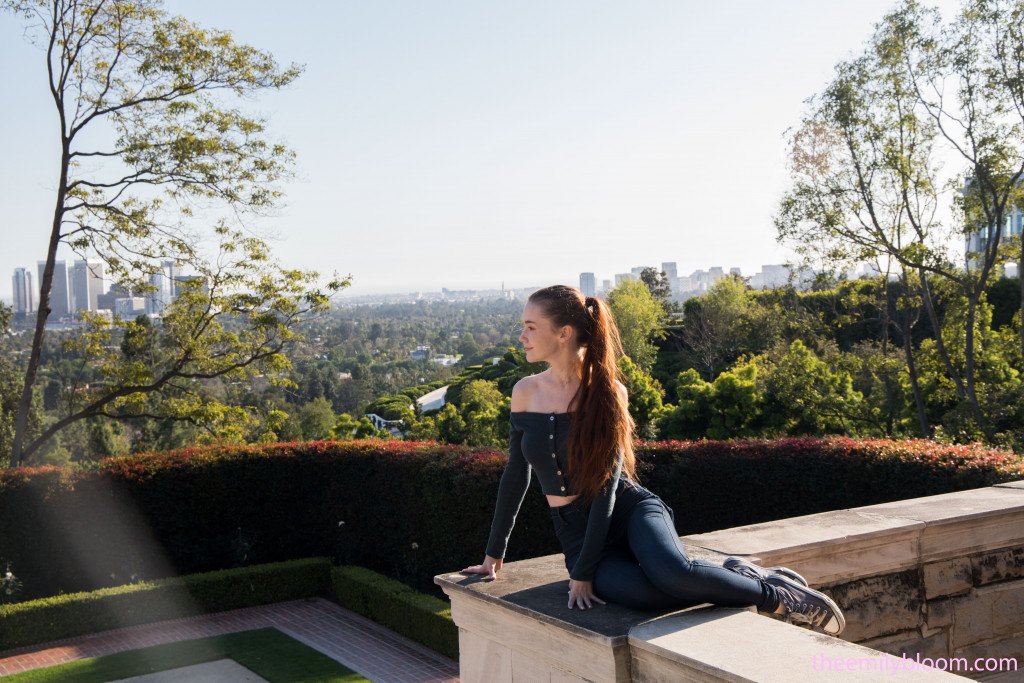 Smoking hot Emily Bloom takes off her tight pants outdoor showing off her sweet ass  in The Emily Bloom set Mansion Flashing