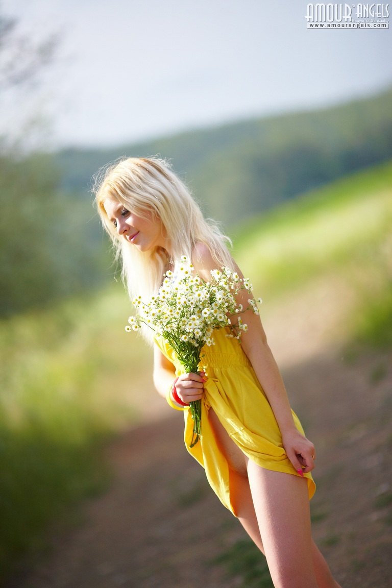 Alina starts with posing in yellow dress then gets rid of it very willingly  in Amour Angels set Shining