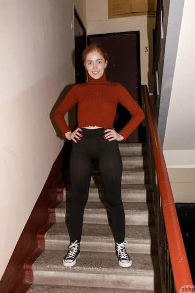 Sexy redhead in black yoga pants and red sweater Jia Lissa showing her attributes on the stairs  in Zishy set My Blacked Baby