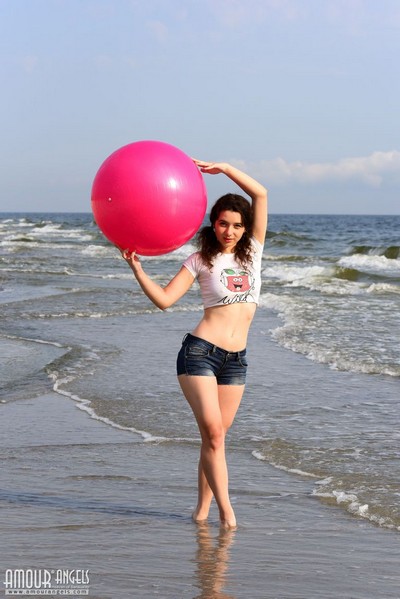 Attractive young girl with a nice natural body is spreading her legs on the gym ball  in Amour Angels set Jump Jump